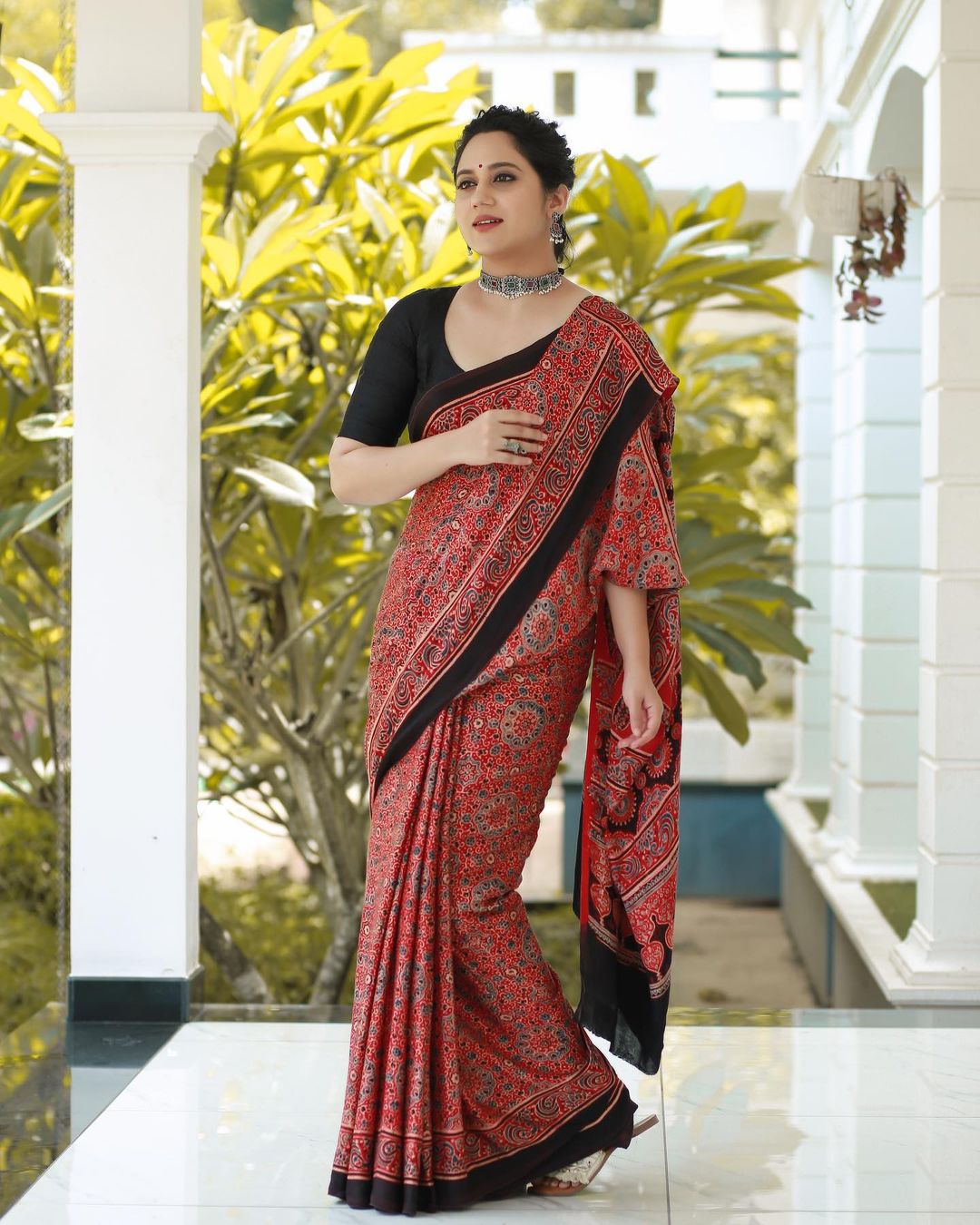 Malayalam Actress Miya George Images in Maroon Saree Black Blouse